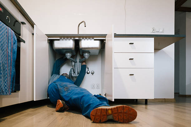 Professional Drain Cleaning technician working in Missoula, MT